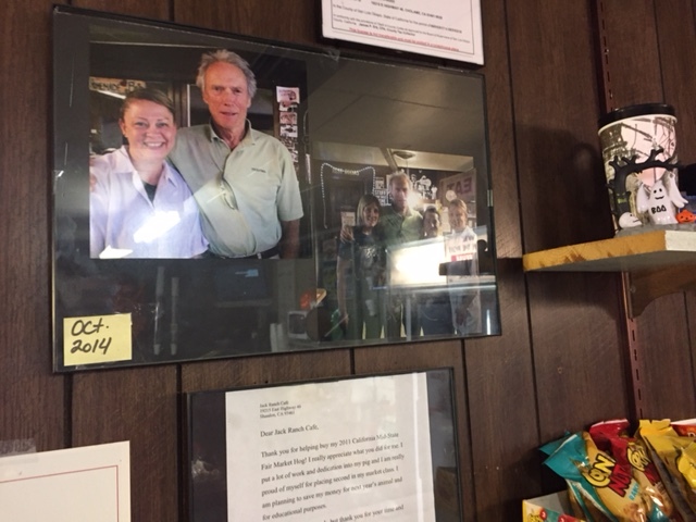  Clint Eastwood posed with the operators of the Jack Ranch Café when he visited the James Dean Memorial.  Photo by Steve Newvine 