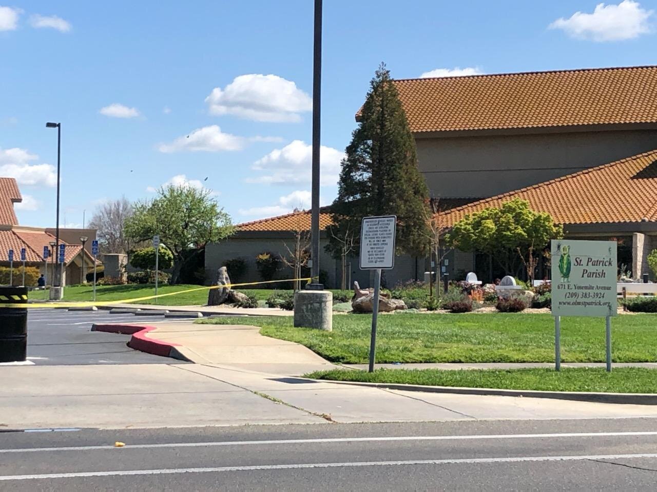 Barriers have been placed at the parking lot entrances at St. Patrick’s Church in Merced. Photo: Steve Newvine 
