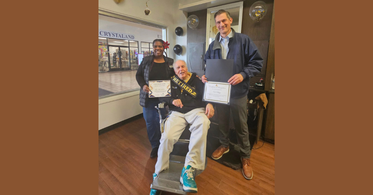 Cel is congratulated on his last day at the Merced Mall Barber Shop by Merced Mayor Matthew Serratto. Photo: Mayor Serratto