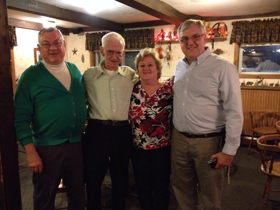  My brother Terry, dad, sister Becky, and me. Photo; Newvine Personal Collection 