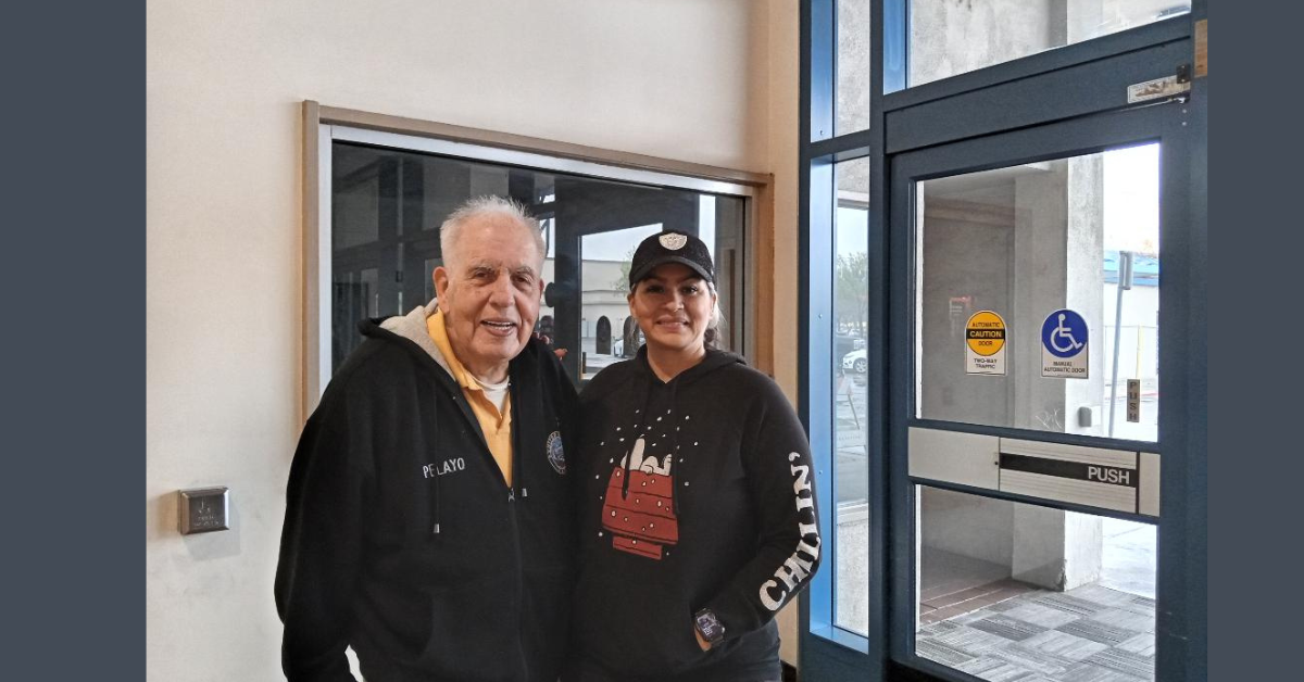 Cel stands in front of the window of his former shop at the Merced Mall alongside his daughter Annette. Photo: Steve Newvine