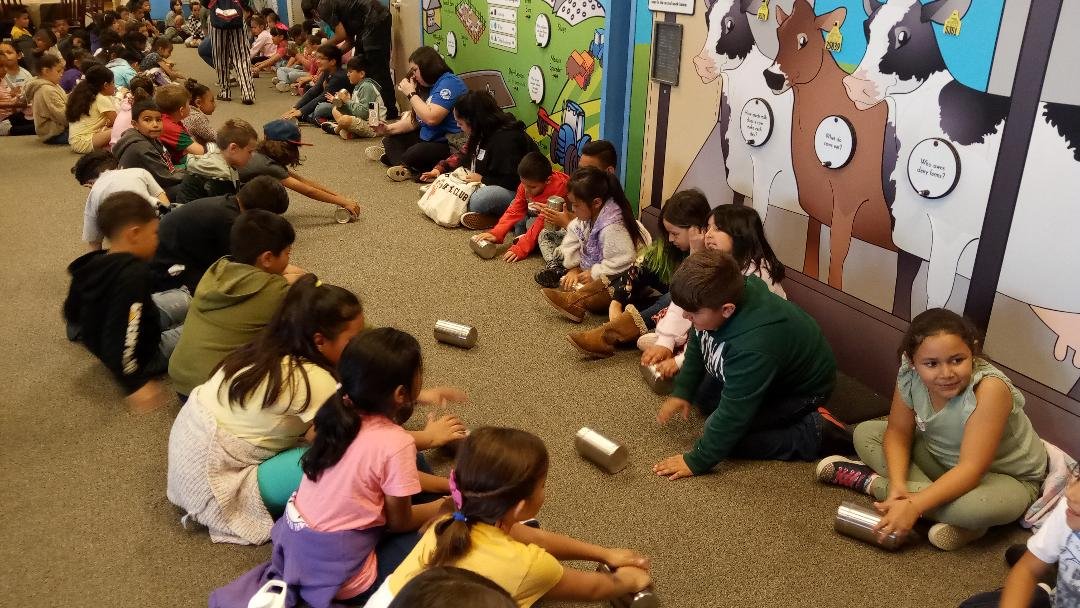 Grade schoolers from Ceres Unified take part in a make-believe ice cream making activity at the Hilmar Farms Visitor Center. Photo: Steve Newvine