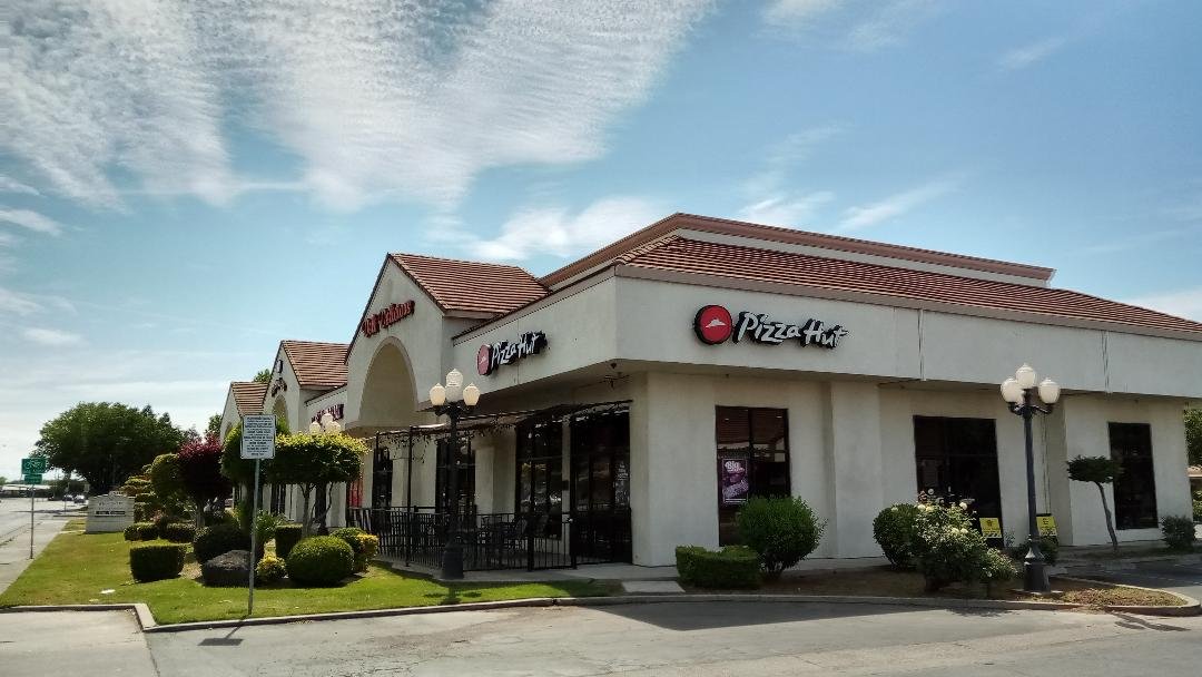  When the original Olive Avenue Starbucks moved to a new spot near Merced Mall, the old space was leased to Pizza Hut.  The pizza chain moved across the street on Olive to take over the space while Dutch Brothers Coffee opened a brand new store at the former Pizza Hut spot.  Photo:  Steve Newvine 