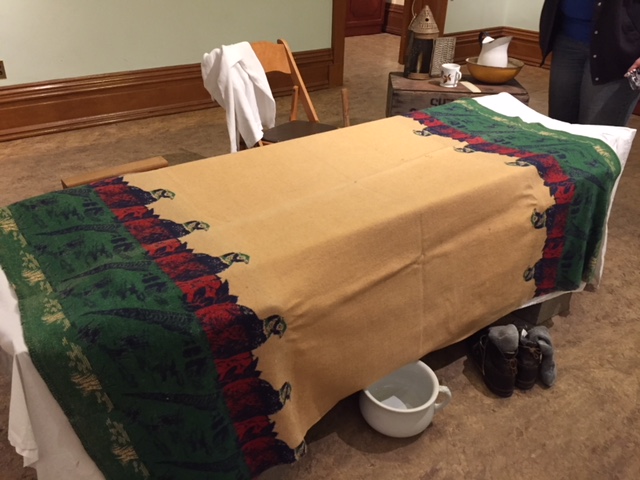   The Merced County Courthouse Museum has created this display that suggests what a worker in a Yosemite Lumber Company bunkhouse might have had.  Photo by Steve Newvine   