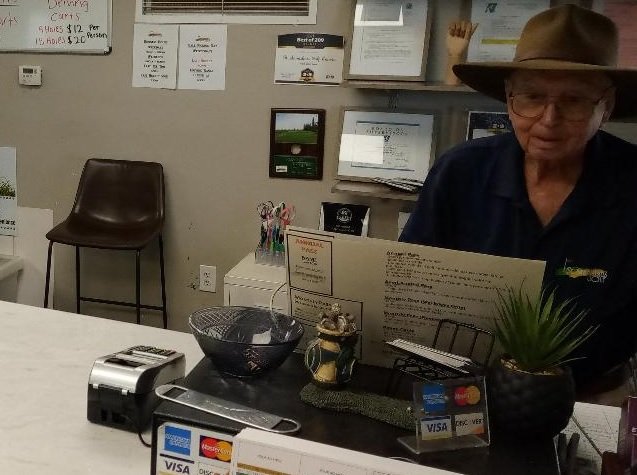  Charlie Brown from his post at the pro shop at St. Stanislaus Golf Course.  Photo:  Steve Newvine 