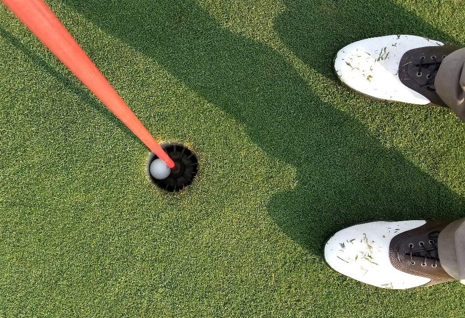  A flag-down view of the hole-in-one ball in the cup.   Photo: Newvine Personal Collection 