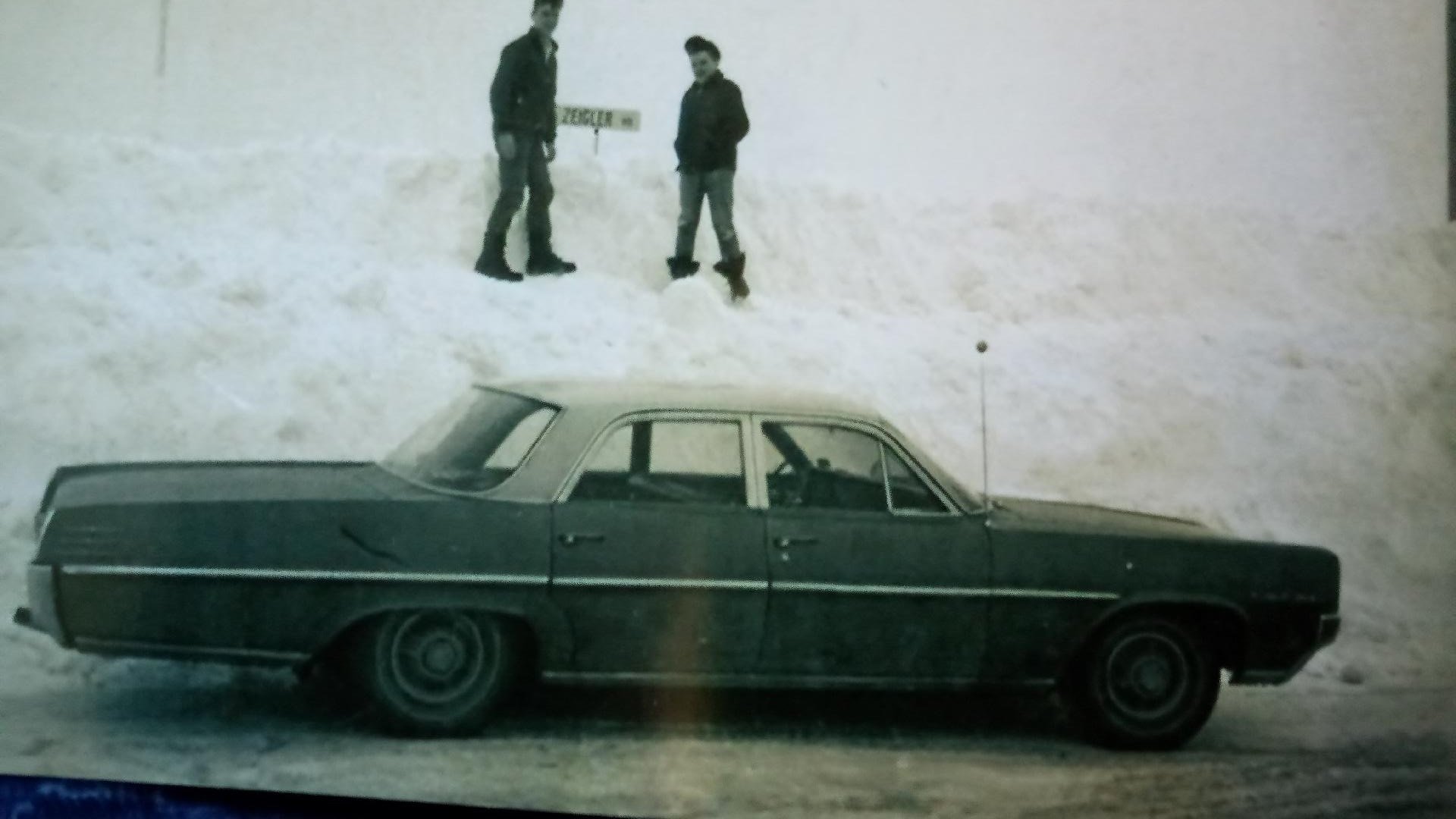 That’s my older brother and me on top of a snowbank during a particularly heavy snow-filled winter in upstate New York. The family car, a Pontiac Star Chief, is parked below us. Photo: Newvine Personal Collection