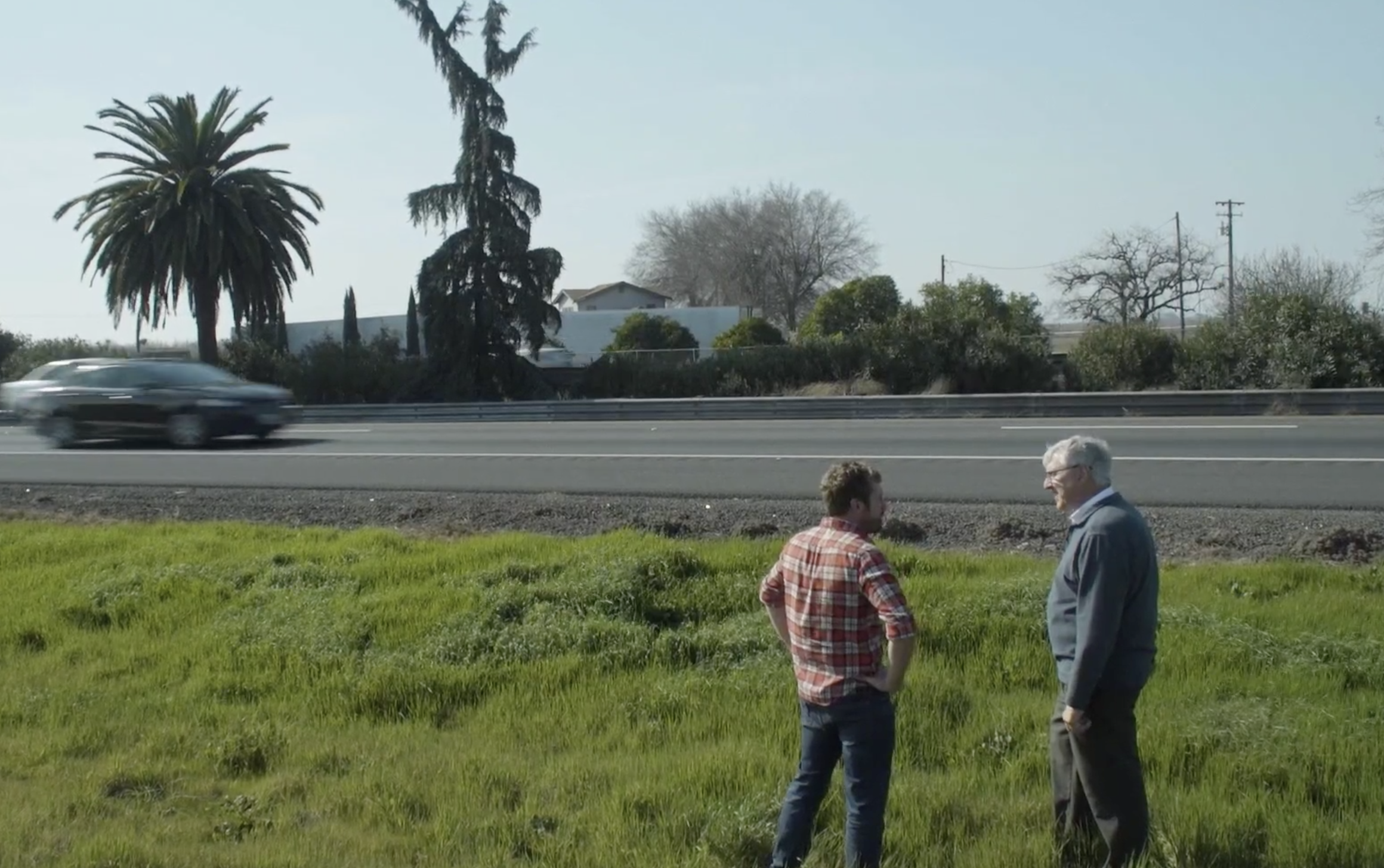 John Bartell interviews Steve Newvine near the site of the palm and the pine in Madera County. Photo from KCRA video story.