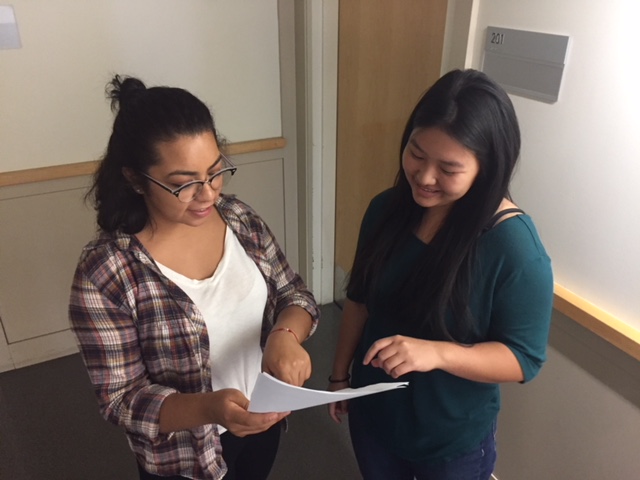  UC Merced interns Rose and Diana are learning from one another as well as learning from their students in the Summer Enrichment Program of the Harvest Park Educational Center.  Photo by Steve Newvine 