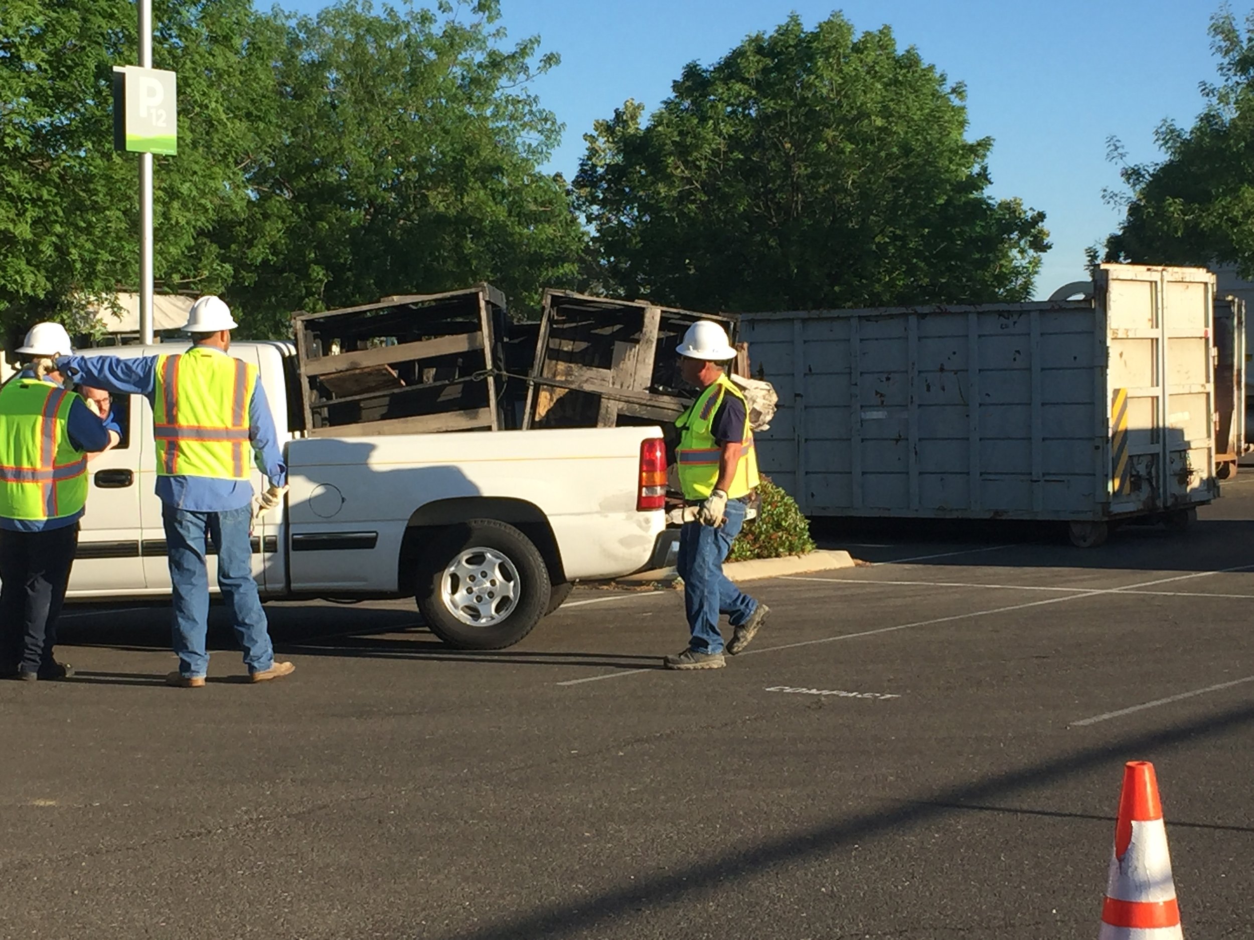  City of Merced workers coordinate the flow of traffic coming into the Clean-Up day drop off site. This is the site at Merced College. The second site is at the Merced County Fairgrounds. Photo: Steve Newvine 