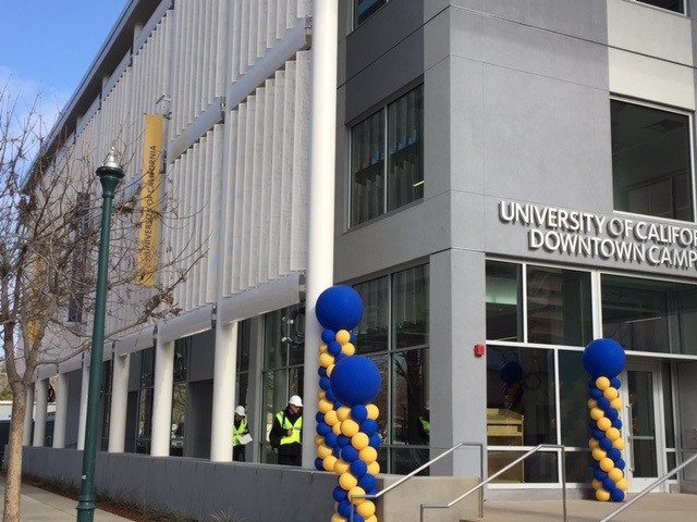   Construction workers checking details as the final touches are being made to the UC Merced Downtown Campus Center.  Photo:  Steve Newvine  
